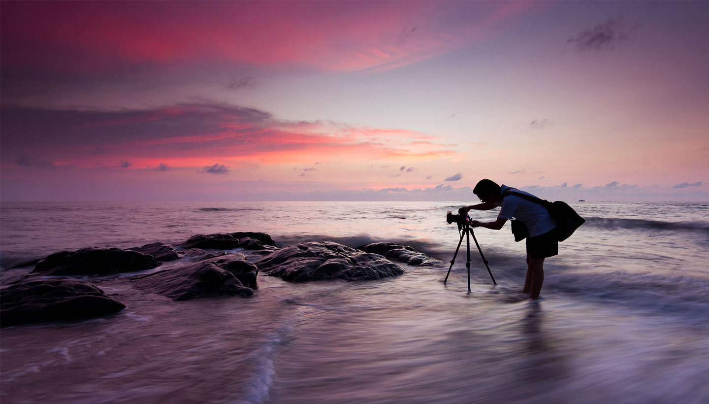 tripod photo setup at the beach