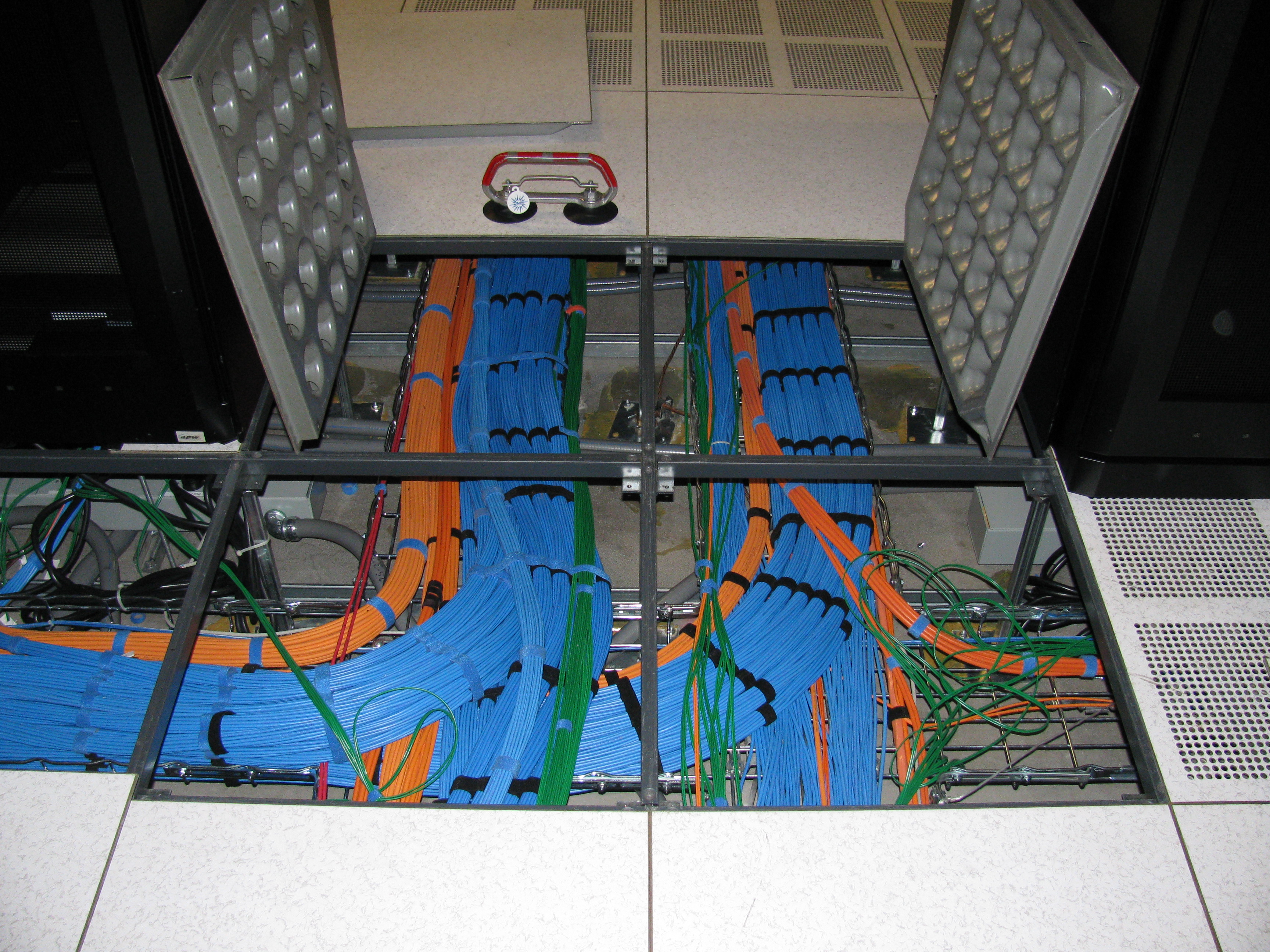 Data center under floor cable runs