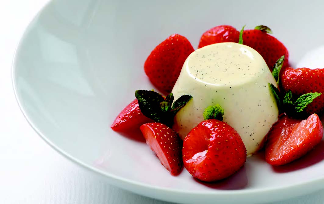 Panna Cooking custard dessert with strawberries