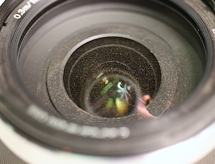 Color run damage to camera lens