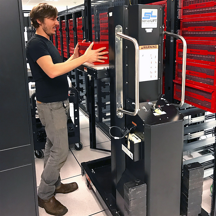 Our server lift, Guido (on the right), helping Joe with the heavy lifting in our data center