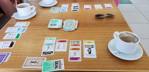 A Monopoly Deal game in progress