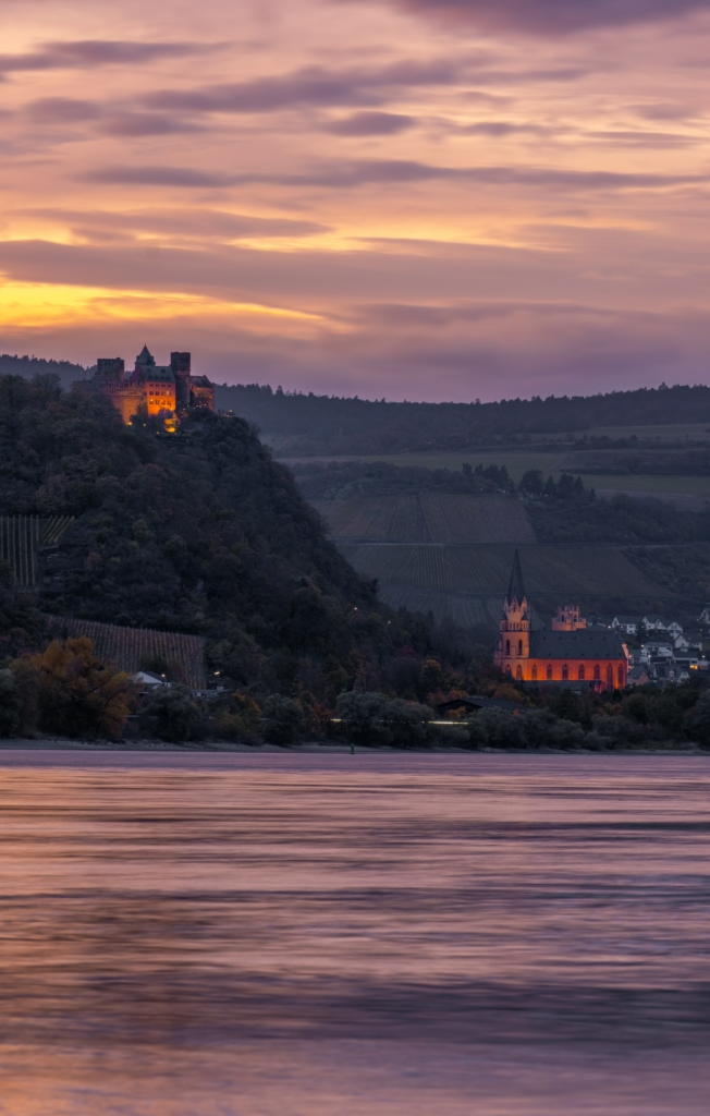 A picture of Schönburg Castle in the Rhine Valley at sunset. 
