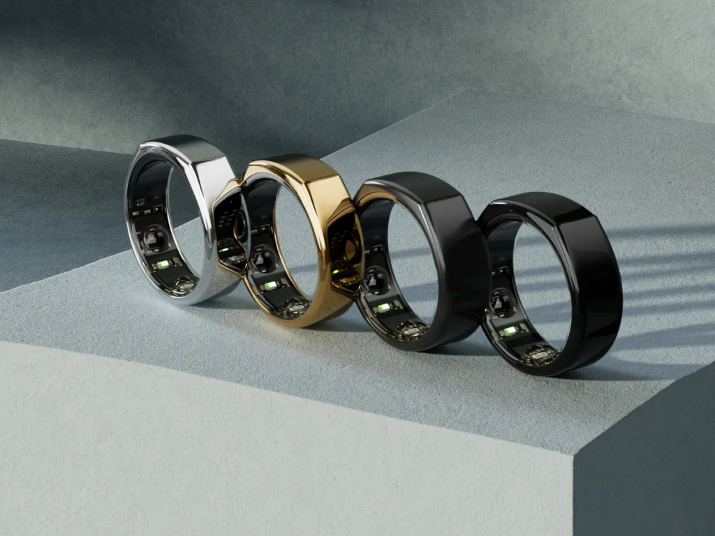 A decorative image showing several of the Oura ring models. 